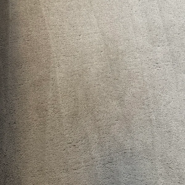 Blood stained carpet after professional cleaning