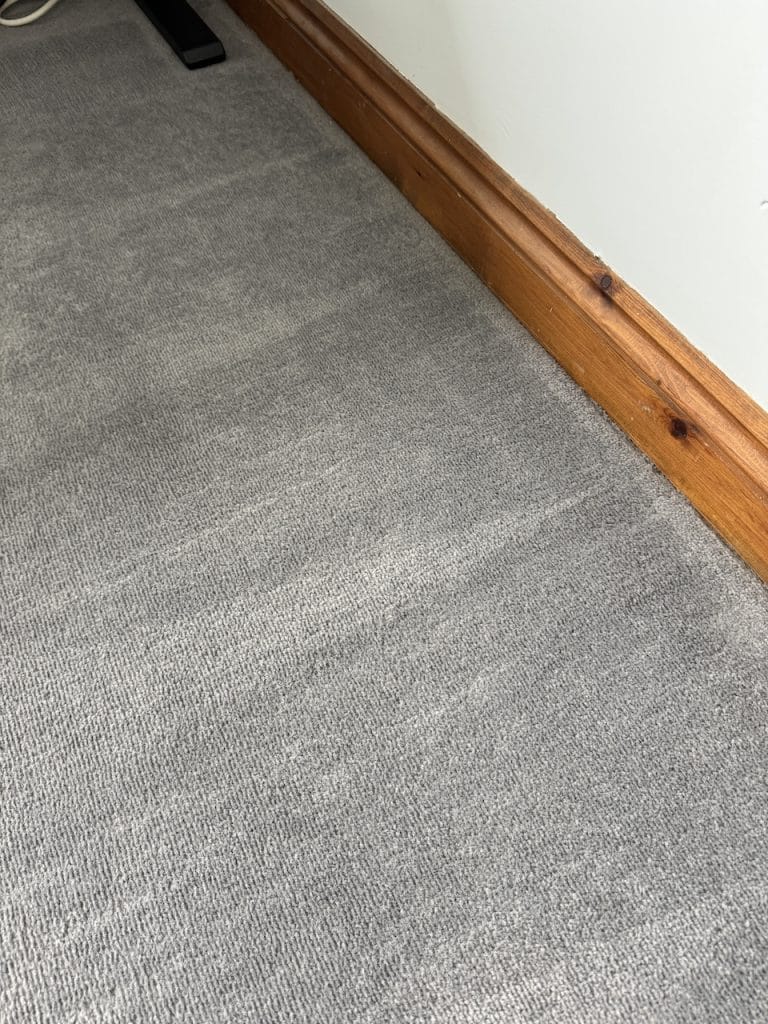 Grey synthetic carpet after professional Sharpie marker removal in Burton Latimer