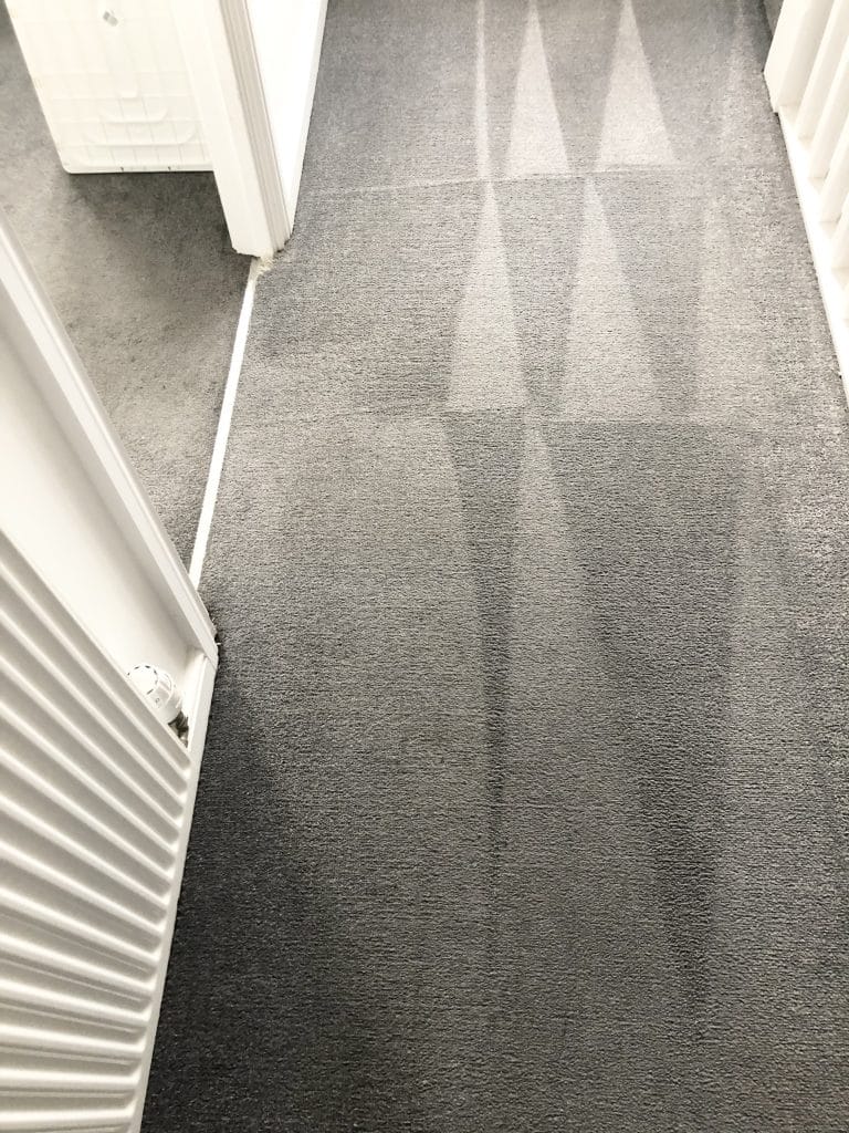 Landing carpet after professional cleaning in Rushden